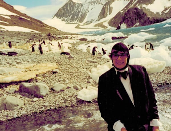 dressing as a penguin in the antartic to create special travel experiences
